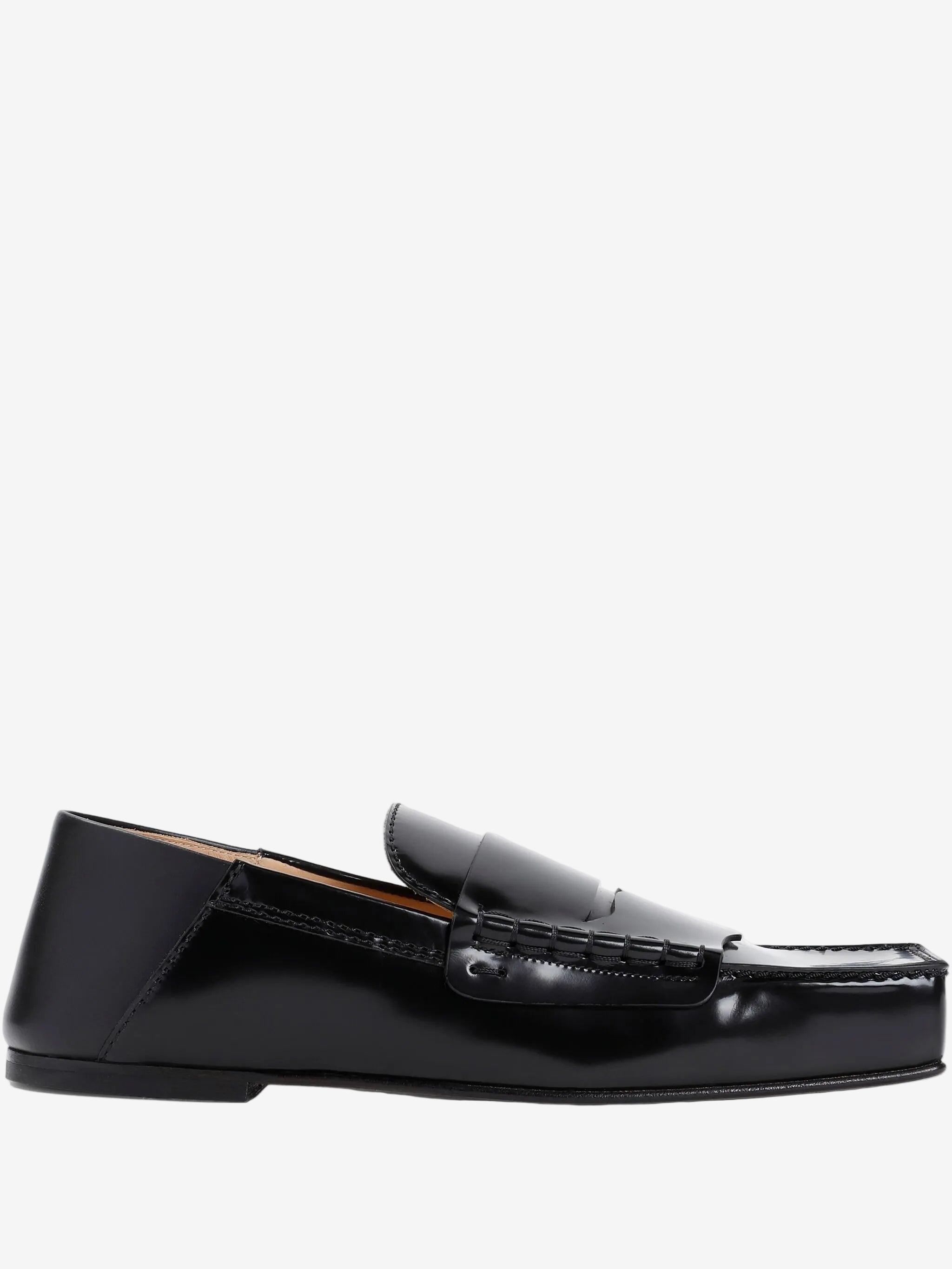 Black loafer shoe on a white background