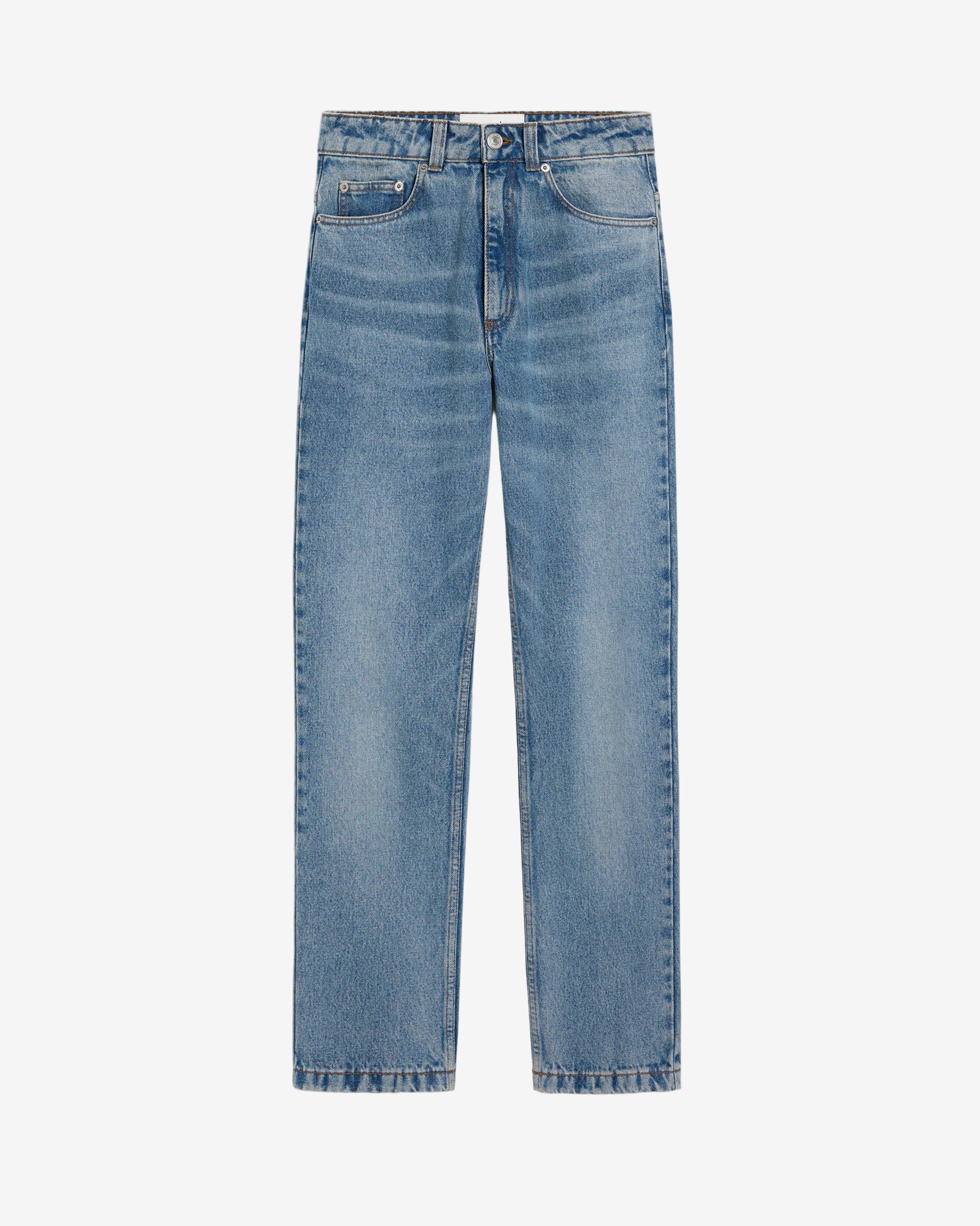 Pair of blue jeans on a light beige background