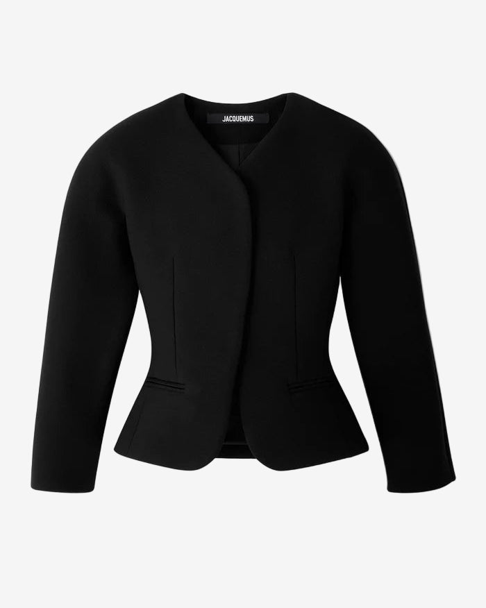 Black peplum jacket on a white background