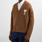 Brown cardigan with a heart and letter 'A' design on a white background ami paris