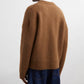 Brown cardigan with a heart and letter 'A' design on a white background ami paris