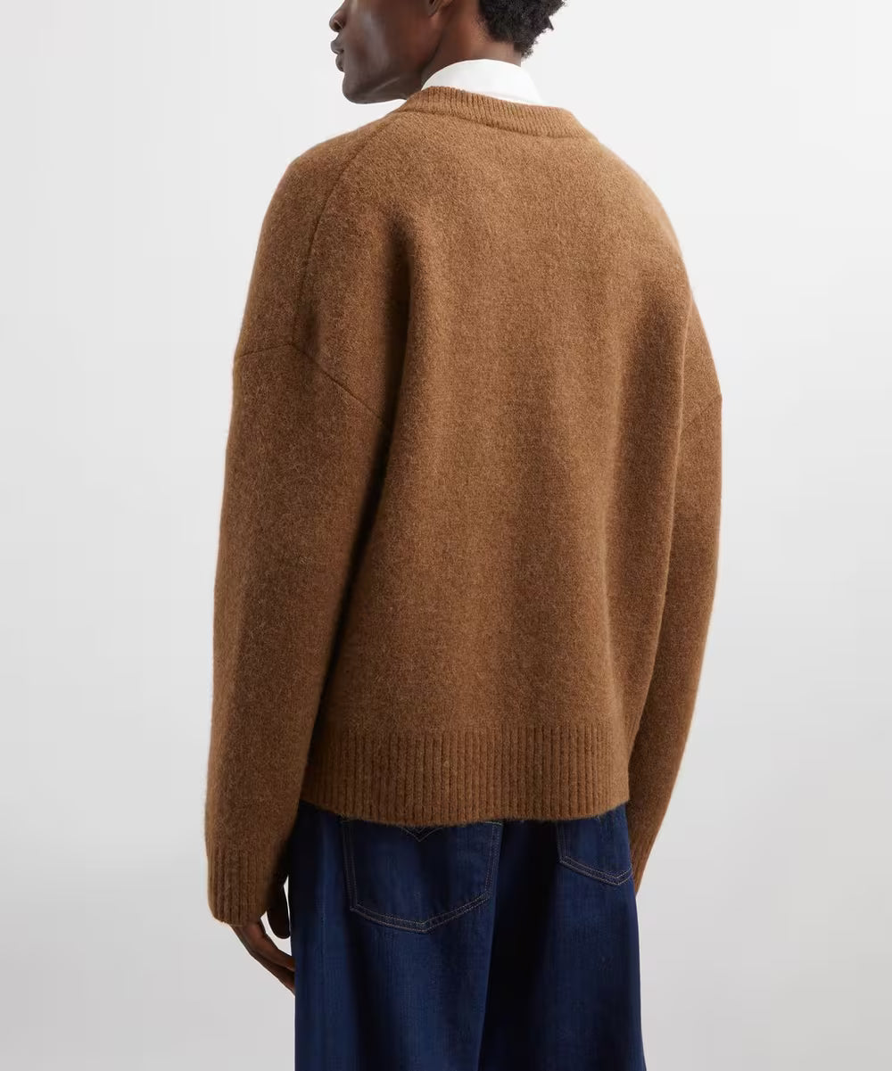 Brown cardigan with a heart and letter 'A' design on a white background ami paris