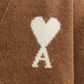 Brown cardigan with a heart and letter 'A' design on a white background ami paris