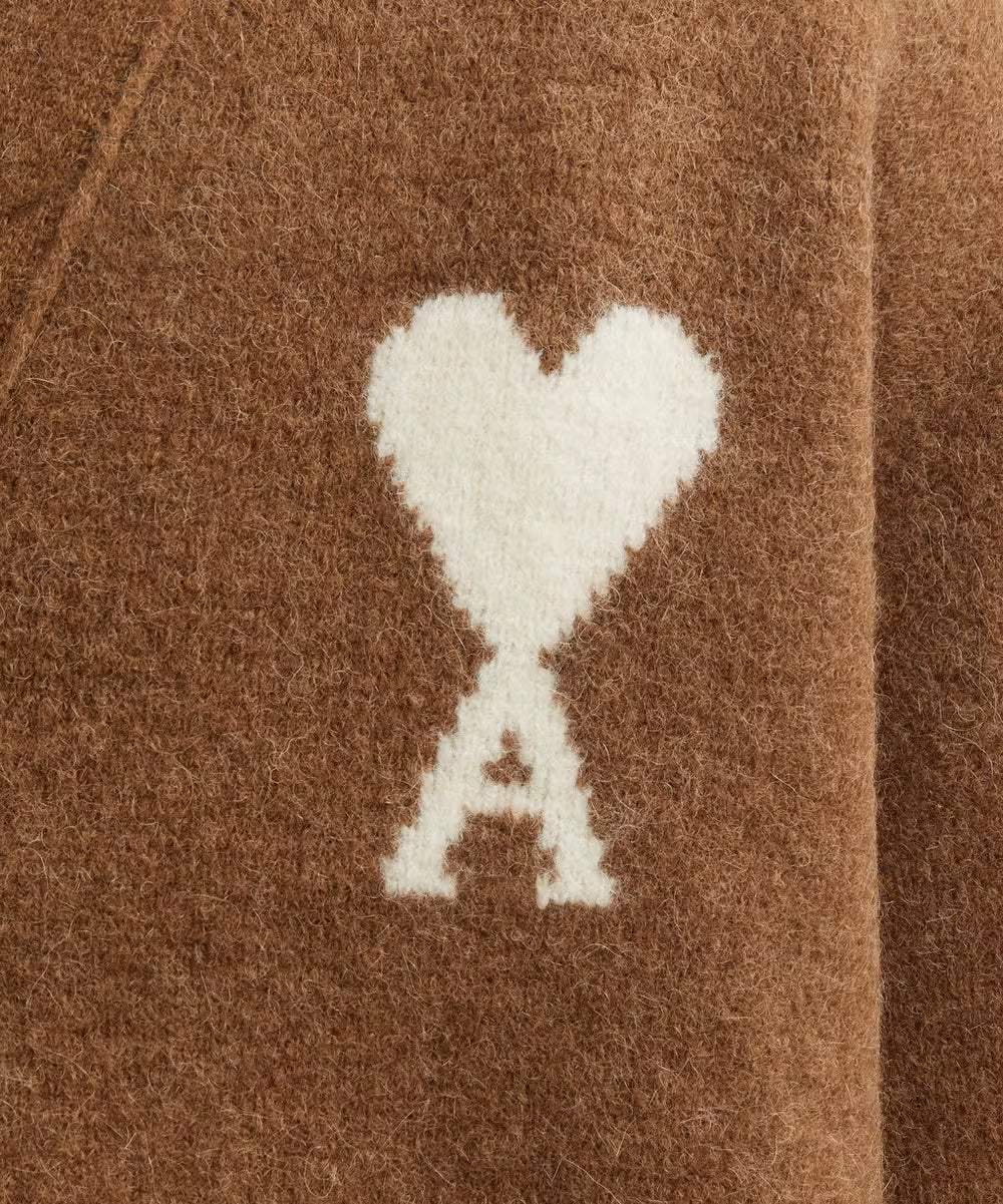 Brown cardigan with a heart and letter 'A' design on a white background ami paris