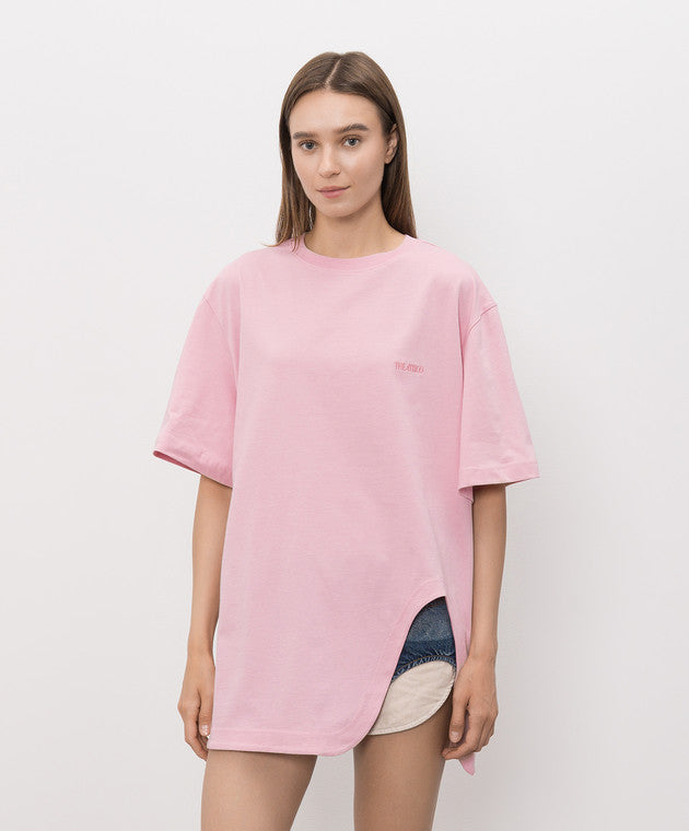 A light pink short-sleeve t-shirt with a small tonal pink ATTICO' logo on the left chest, displayed on a neutral light gray background.