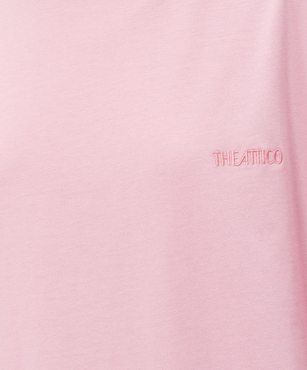 A light pink short-sleeve t-shirt with a small tonal pink ATTICO' logo on the left chest, displayed on a neutral light gray background.