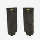 Pair of black gloves with gold logo on a white background AMI PARIS
