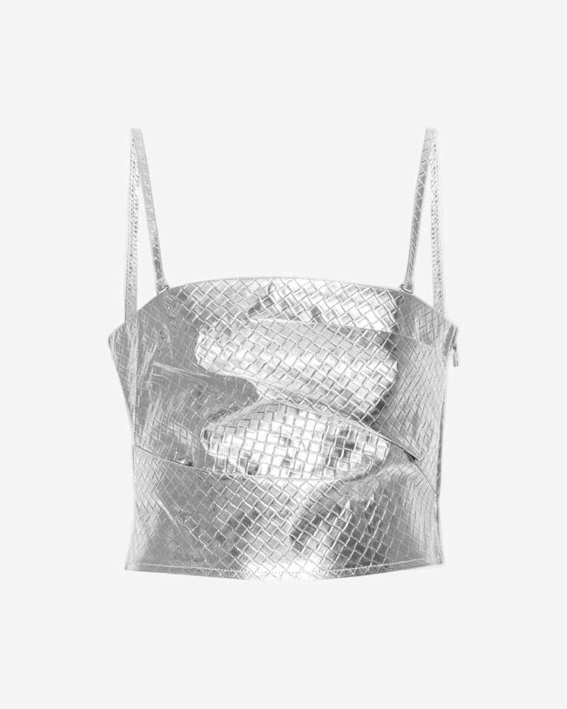 Silver metallic top with thin straps on a white background