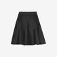 Black skirt on a light gray background