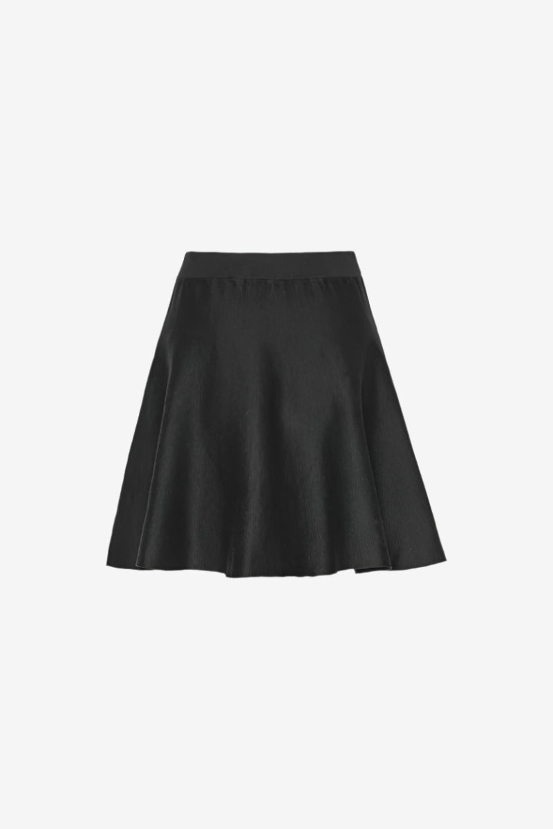 Black skirt on a light gray background