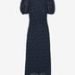 Navy lace dress with puff sleeves on a white background
