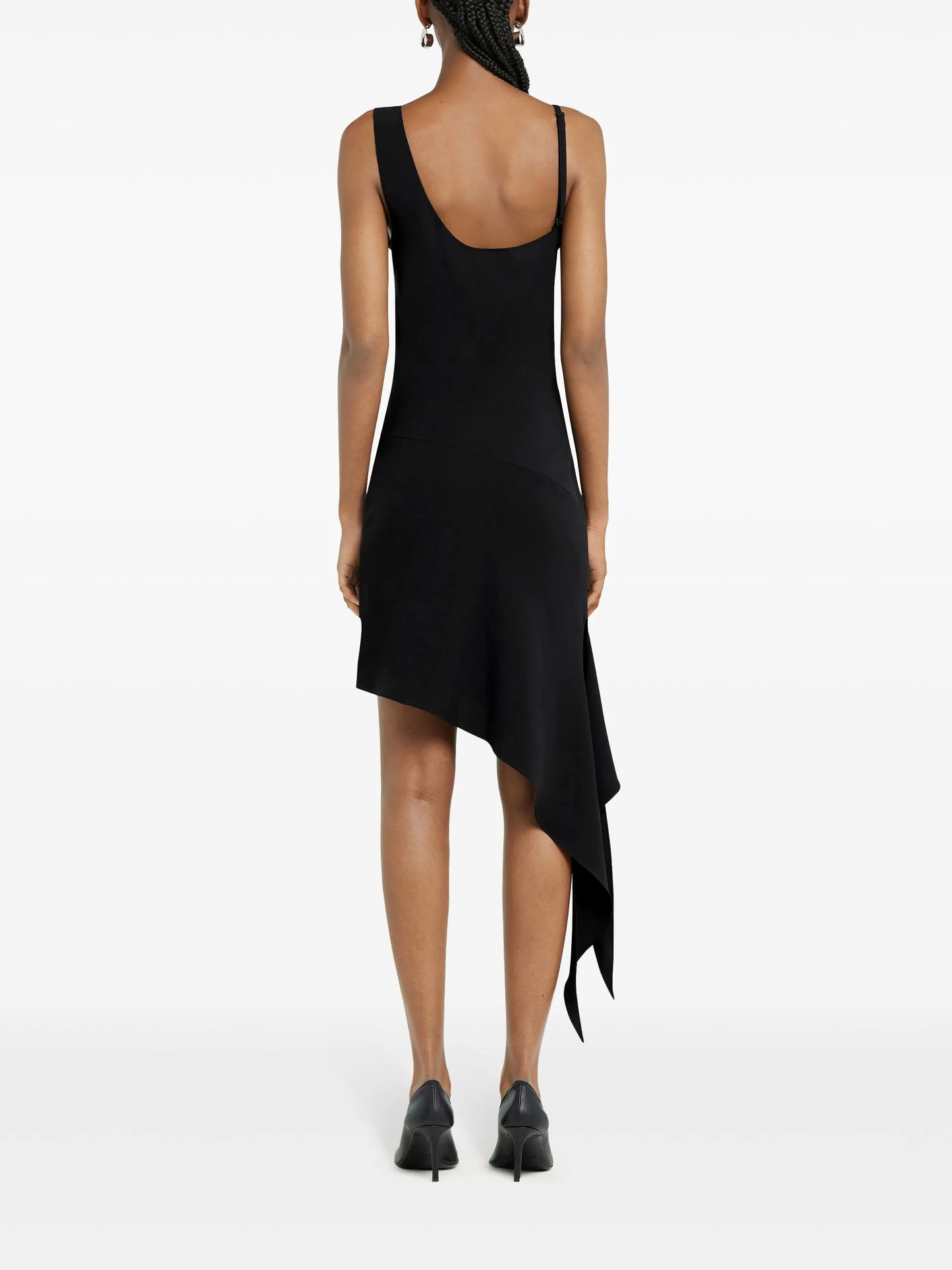 Black sleeveless dress with an asymmetrical hem on a white background