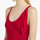 Red dress with an asymmetrical hem on a white background