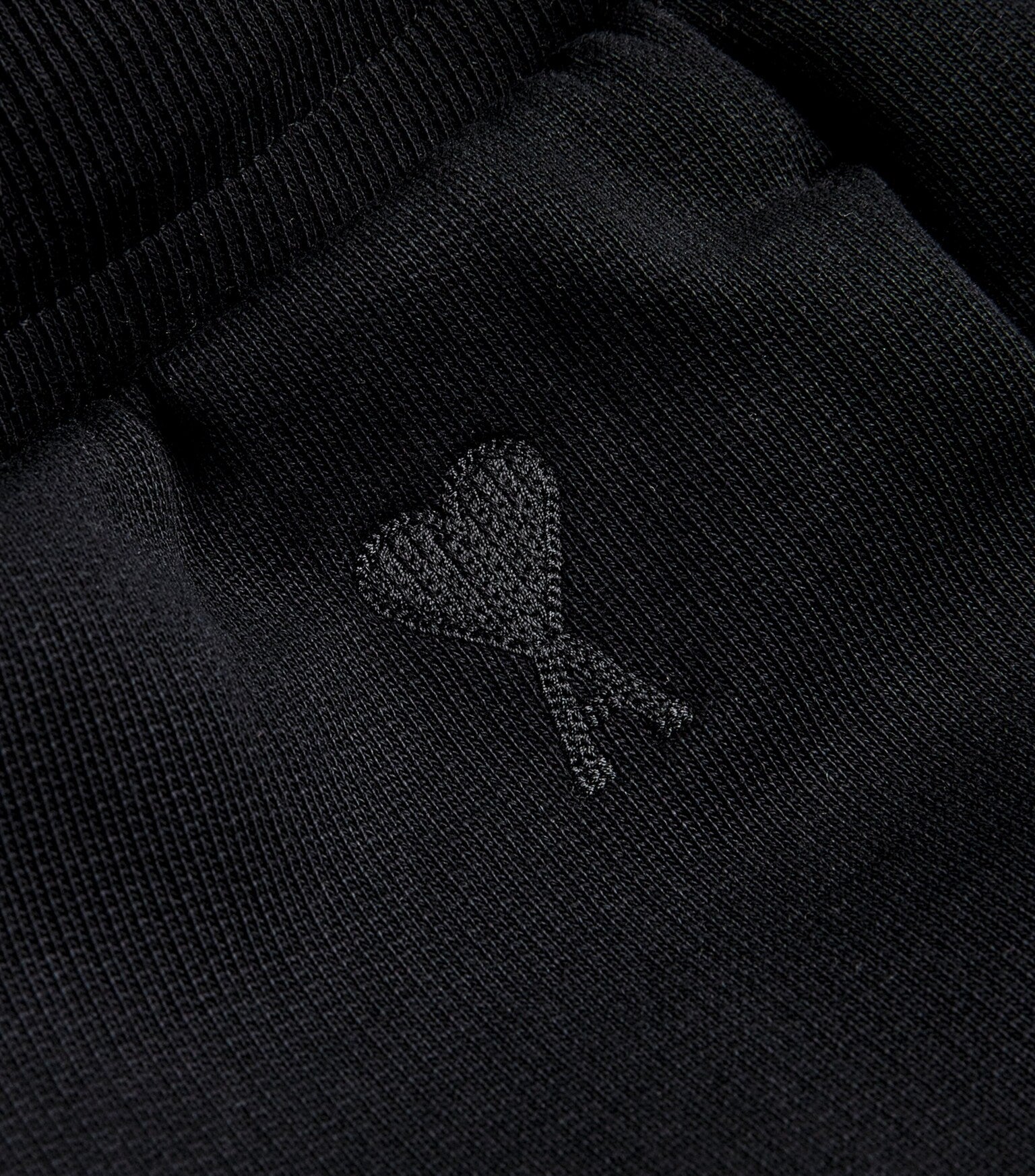 Black sweatpants on a white background