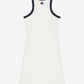 White dress with navy blue trim on a white background