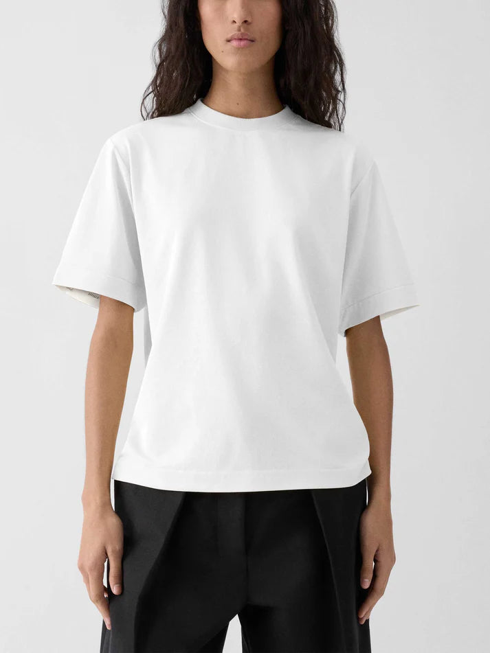 White blouse on a light gray background