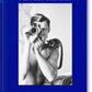 Book cover of 'Peter Beard' with a black and white photo of a man holding a camera.