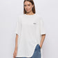 Oversized cotton jersey T-shirt with cutout hem