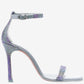 Silver high-heeled sandal with purple gemstones on a white background