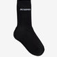 Black sock with 'Jacquemus' branding on a white background