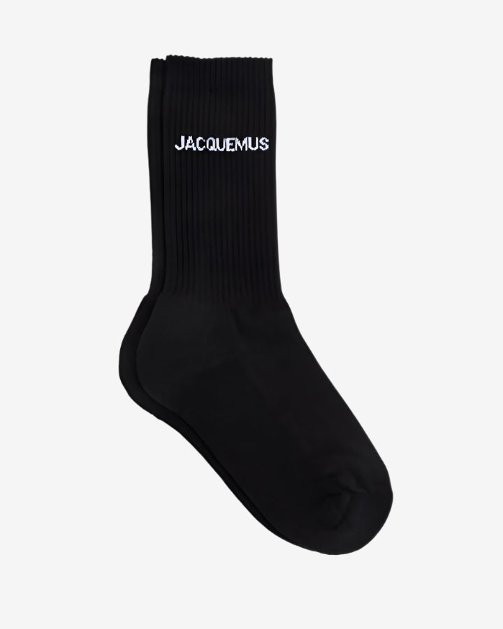Black sock with 'Jacquemus' branding on a white background