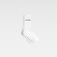 White sock with 'JACQUEMUS' branding on a light gray background