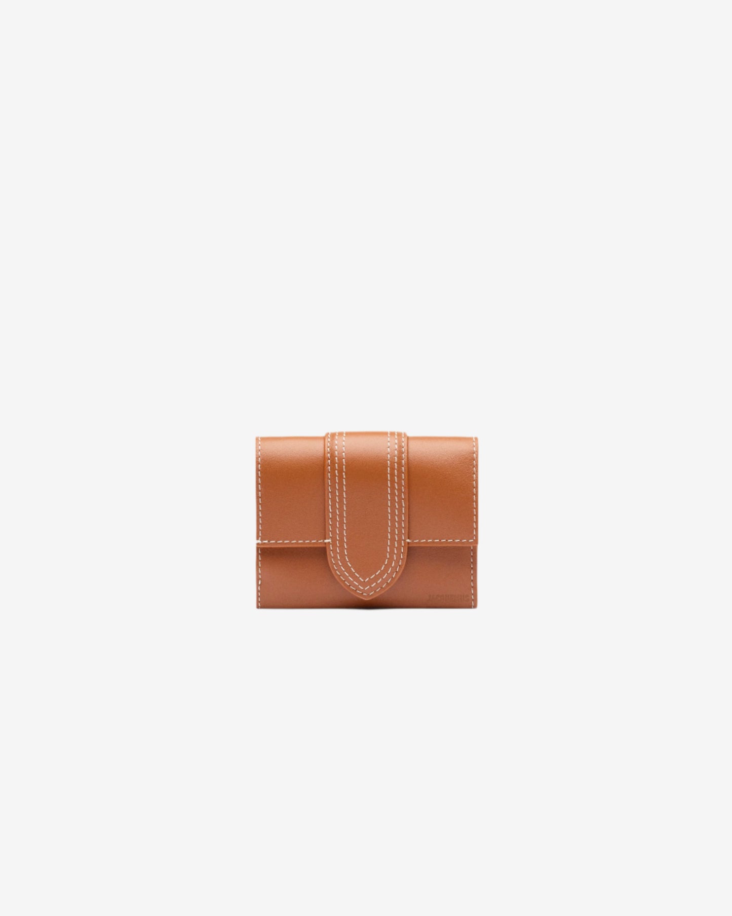 Brown leather wallet on a light beige background