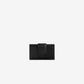 Black leather cardholder on a light gray background