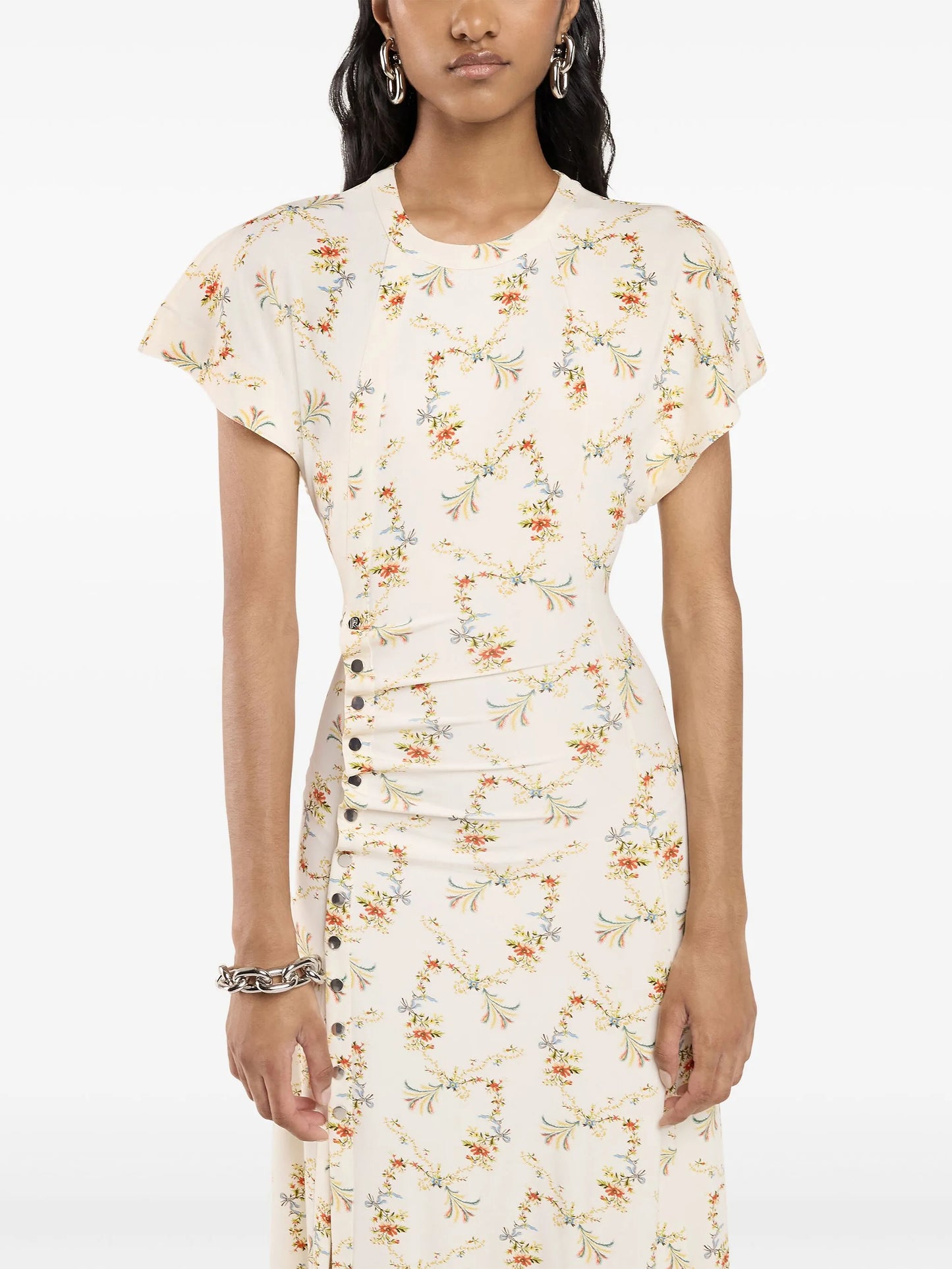 Woman wearing a floral dress on a white background