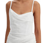 White ruched dress on a white background