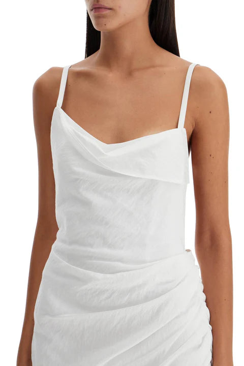 White ruched dress on a white background