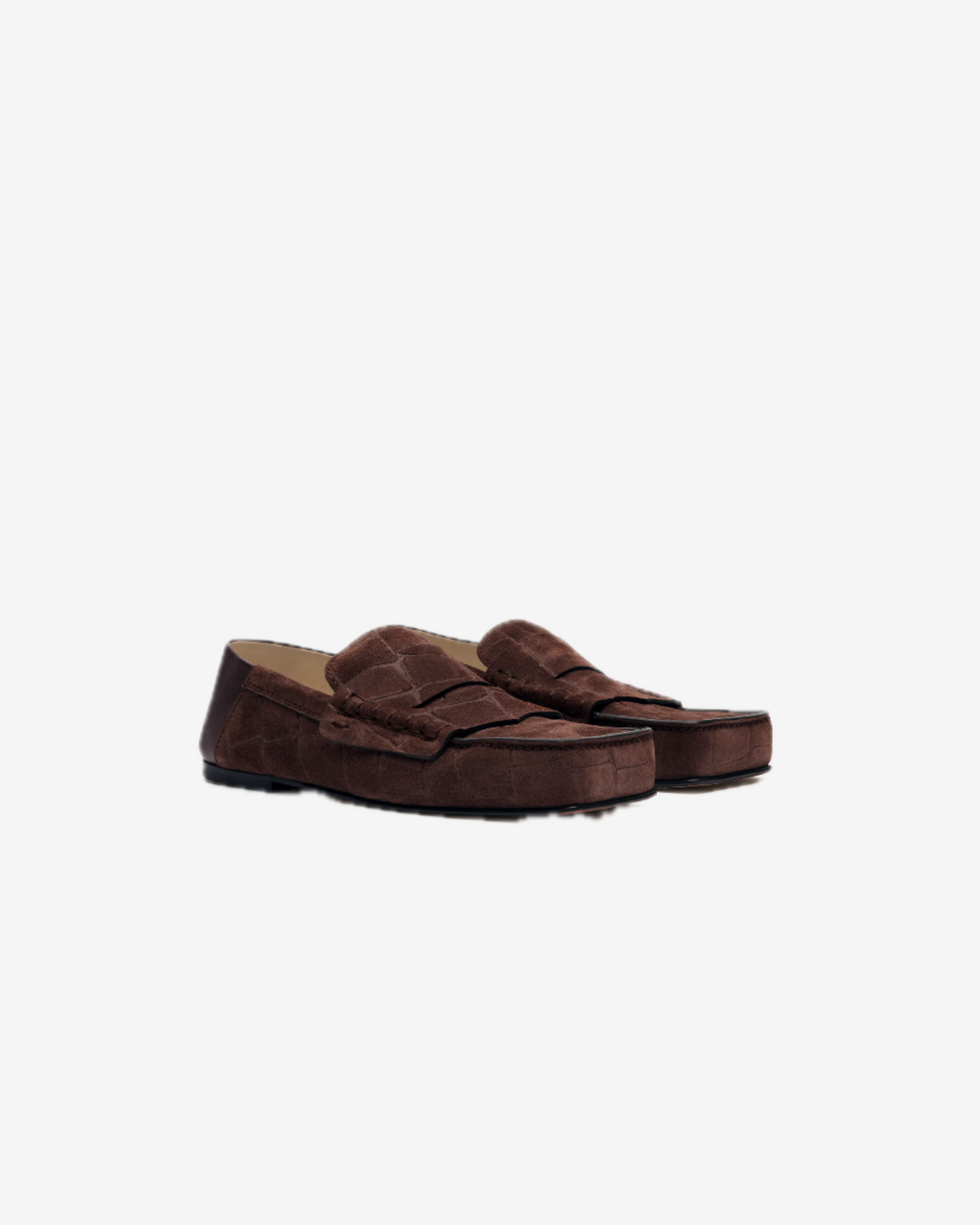Pair of brown loafers on a white background