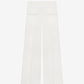White pants on a light beige background