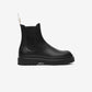 Black rubber boot on a white background