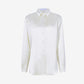 White shirt with yellow accents on a white background
