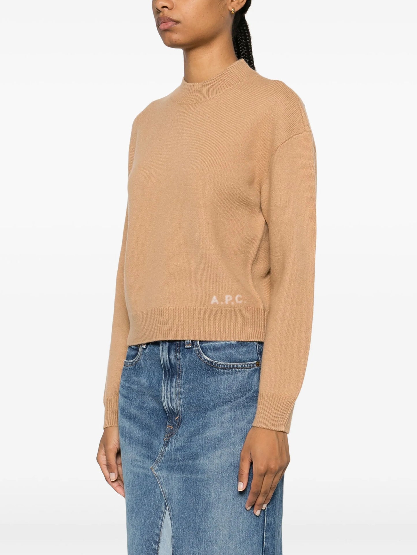 Beige sweater with 'A.P.C.' branding on a white background