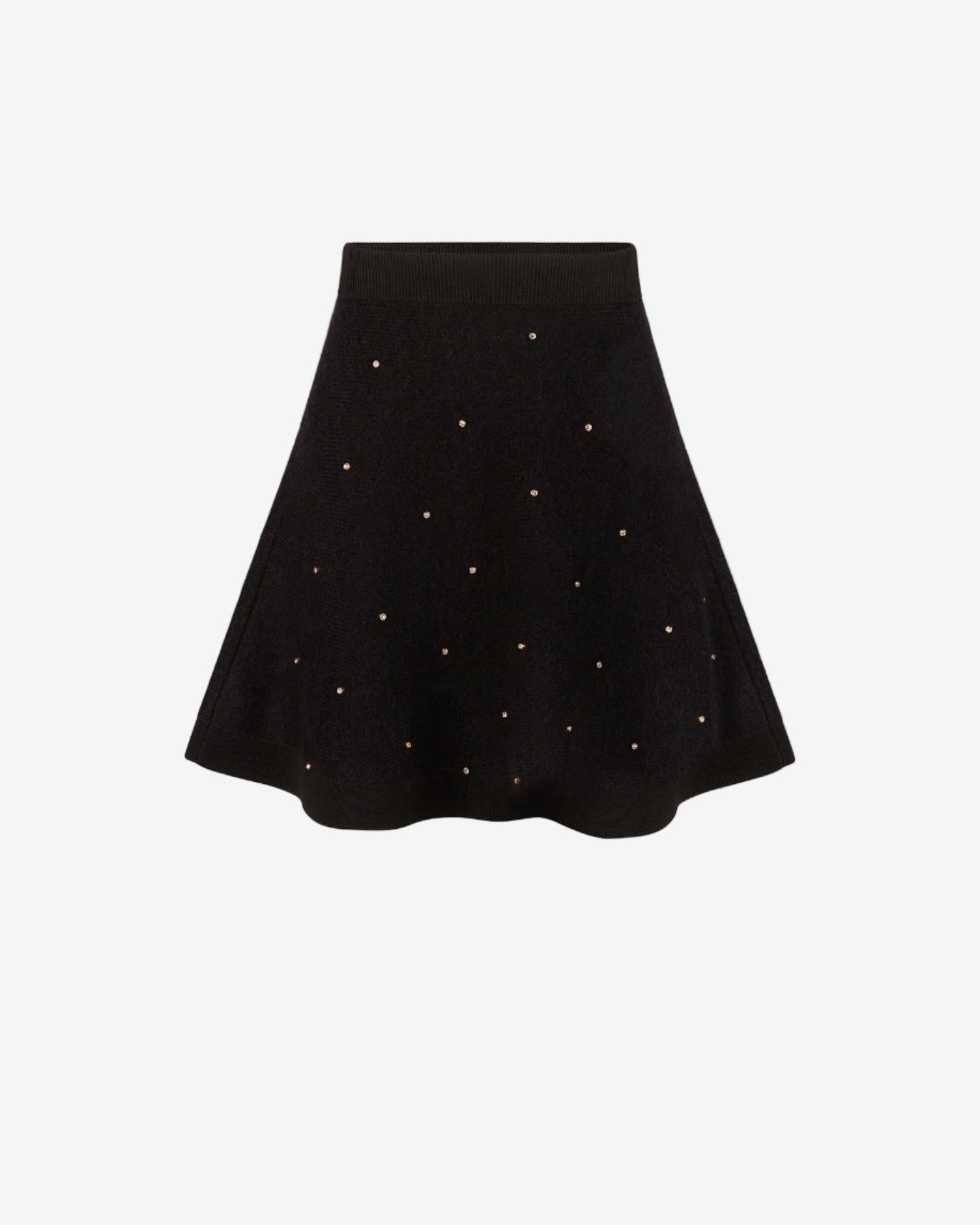 Black skirt with white polka dots on a white background