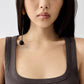 brown Crafted from soft ribbed cotton jersey, this fitted tank top is defined by a second skin silhouette and a minimalist design, finished with the signature grosgrain logo detail at the back.

100% ribbed cotton jersey construction

Fitted, second skin silhouette

Square neckline

Ribbed neckline and armholes

Embroidered grosgrain logo at the back