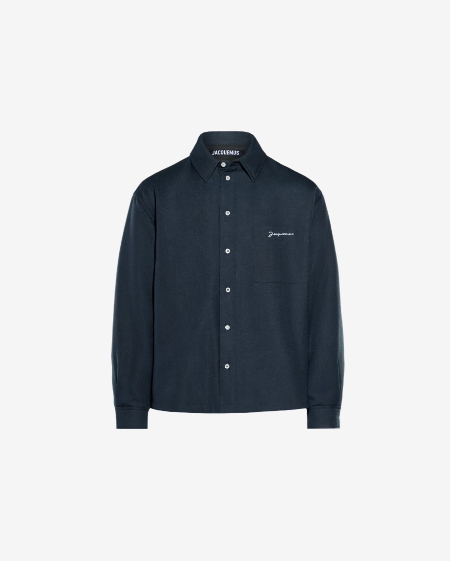 Dark blue shirt with a brand logo on a light gray background