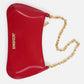 Red handbag with gold chain strap on a white background