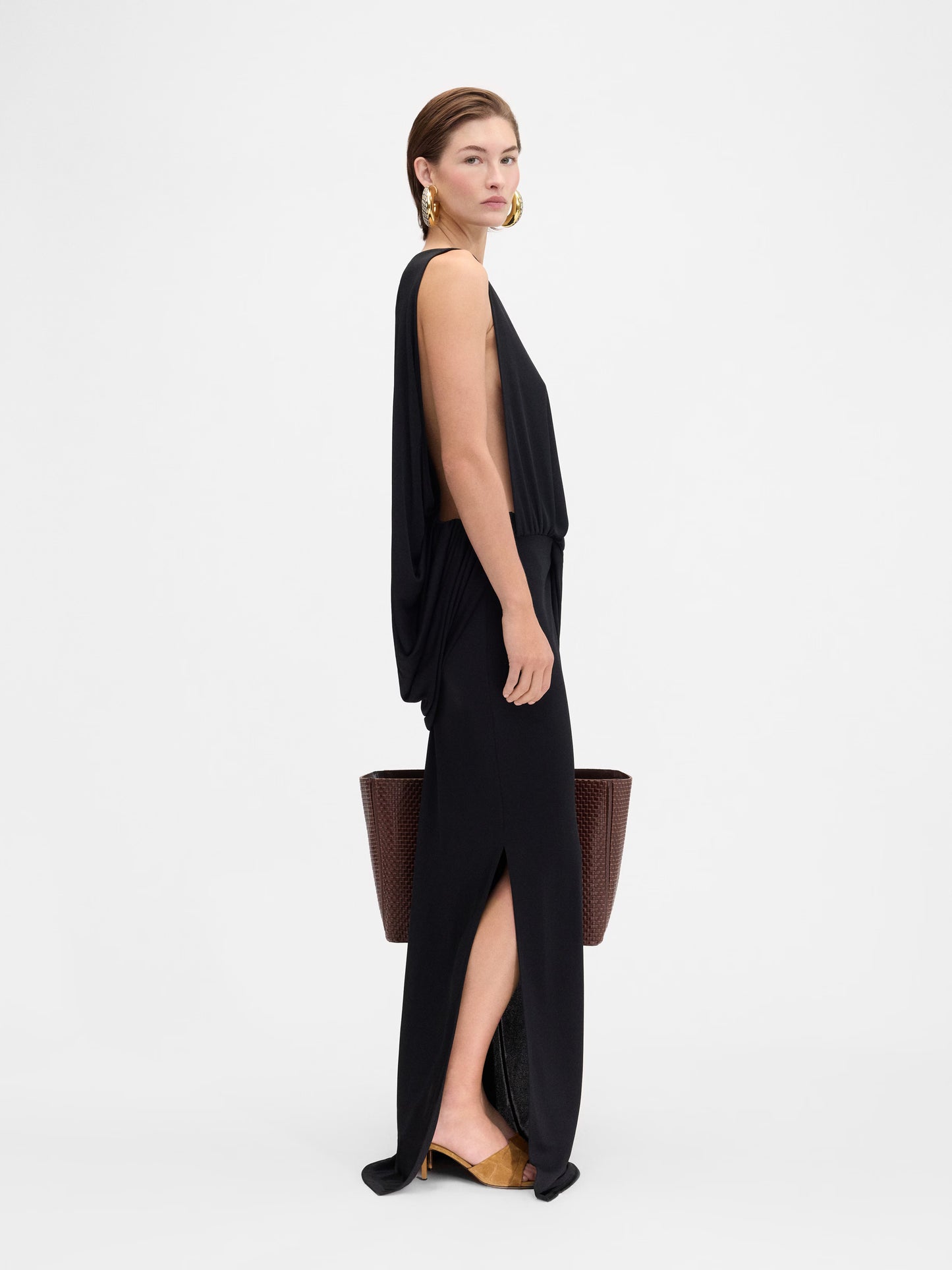 Black strapless gown on a white background