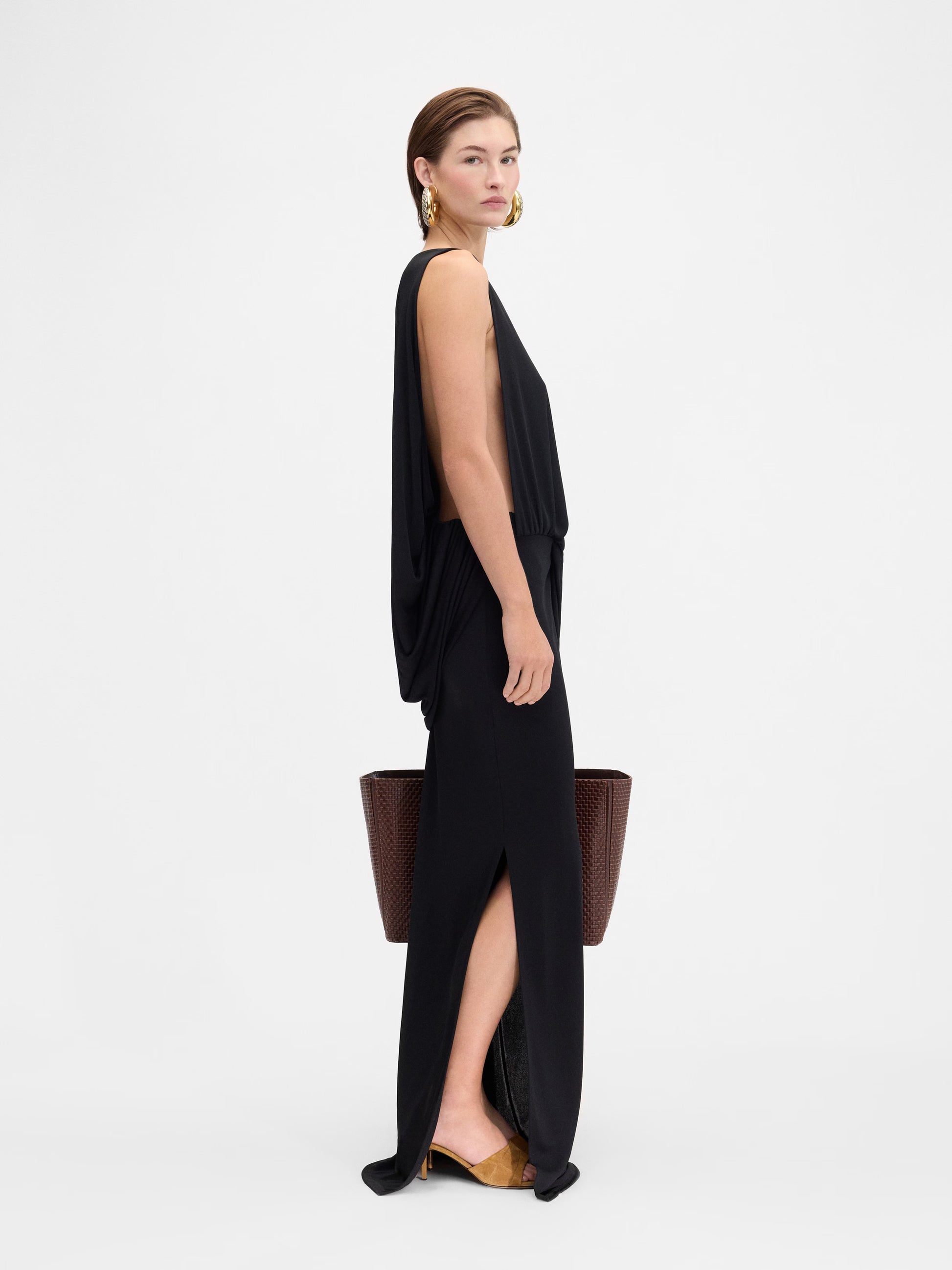 Black strapless gown on a white background