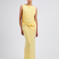 Yellow strapless dress on a light gray background