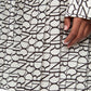 ALL OVER NR LOGO PLEATED MINI SKIRT