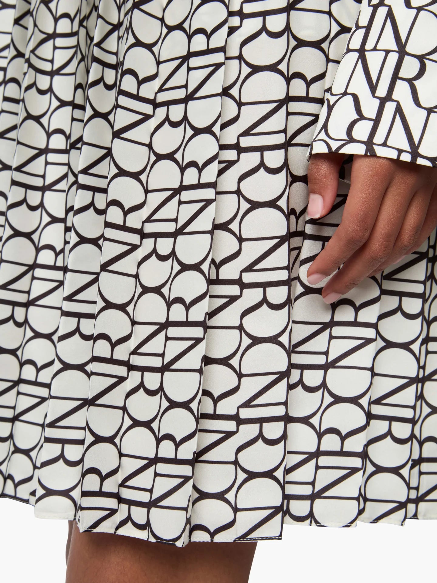 ALL OVER NR LOGO PLEATED MINI SKIRT
