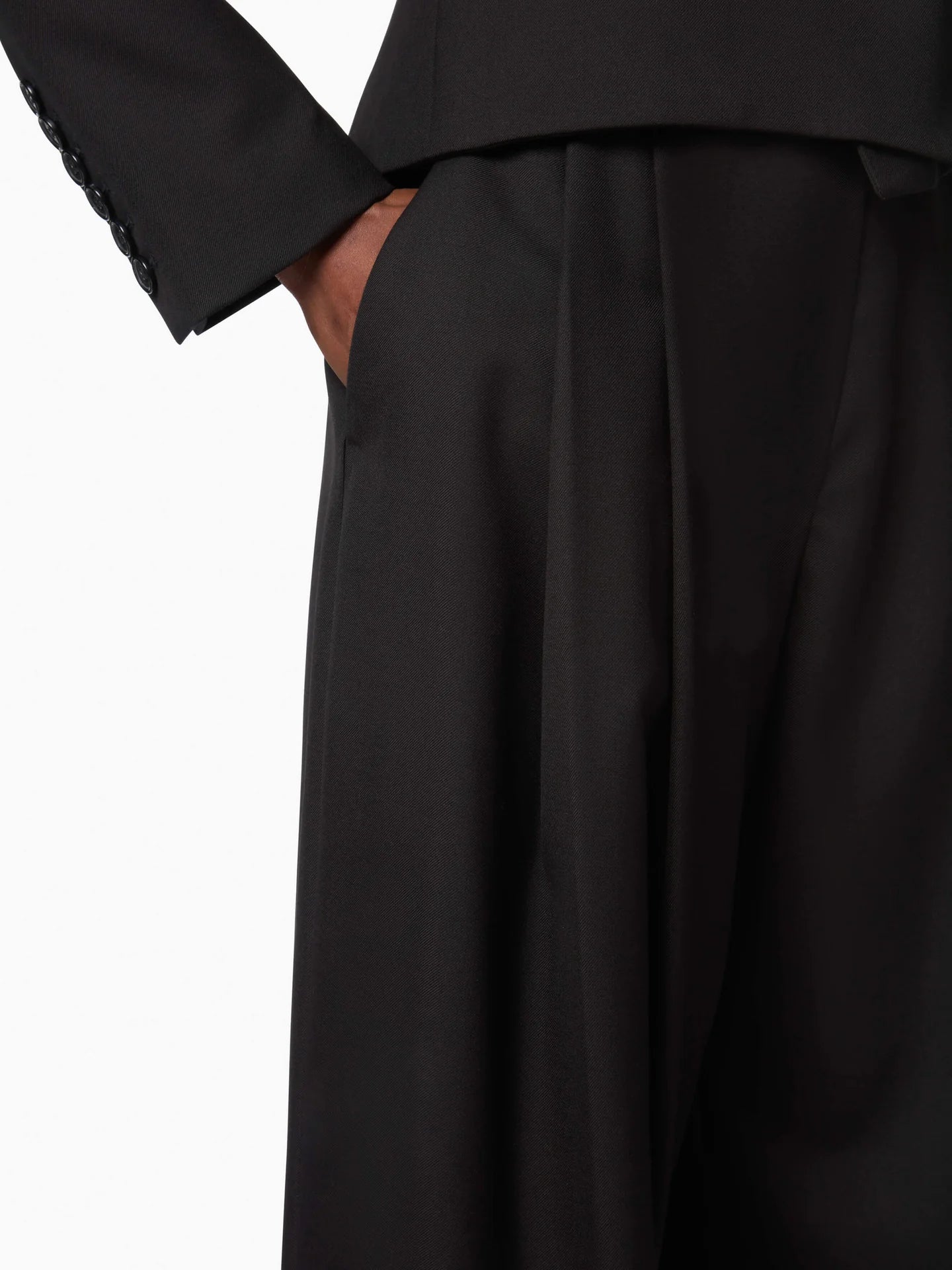 Black wide-leg pants on a white background