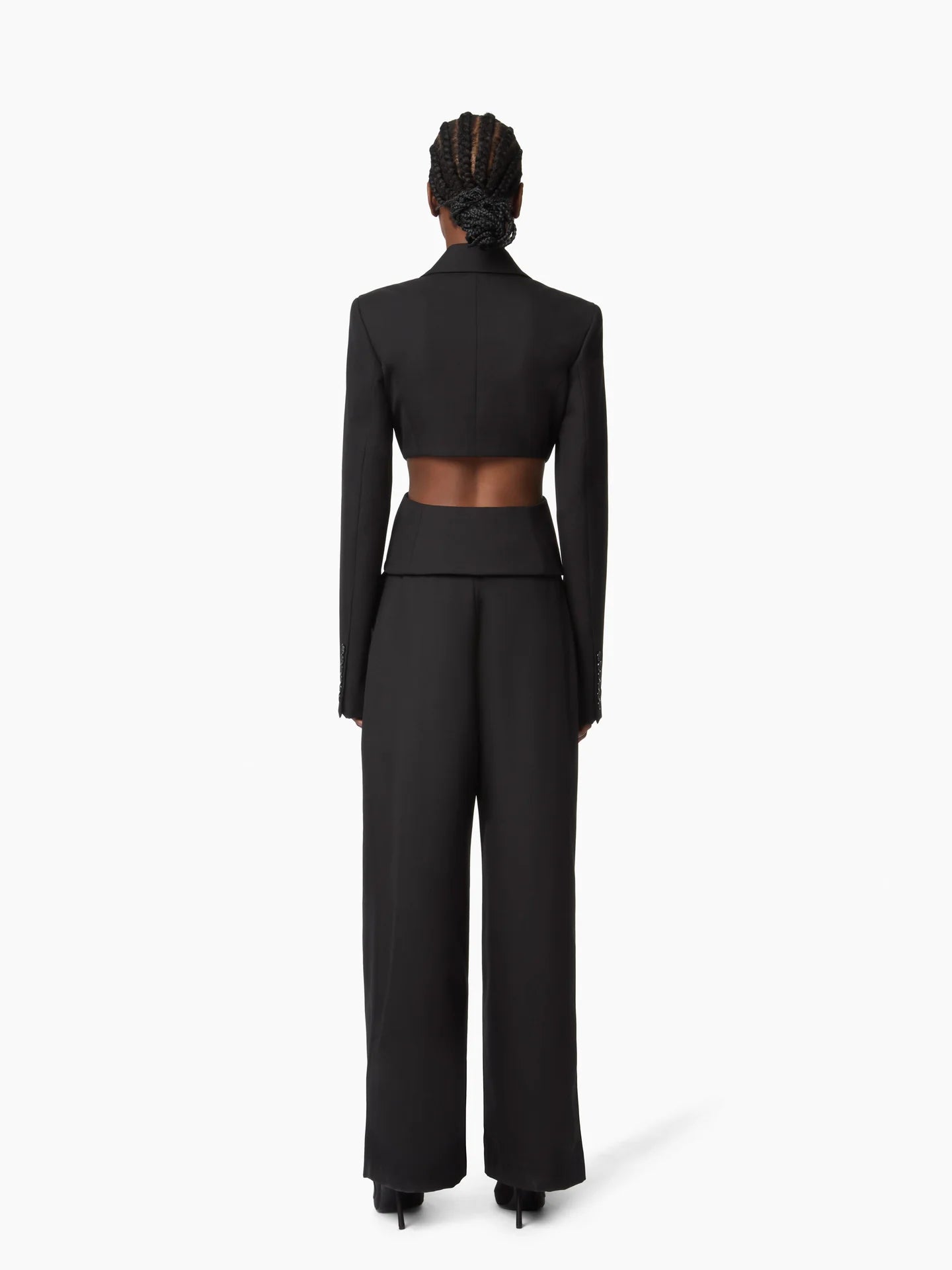 Black wide-leg pants on a white background