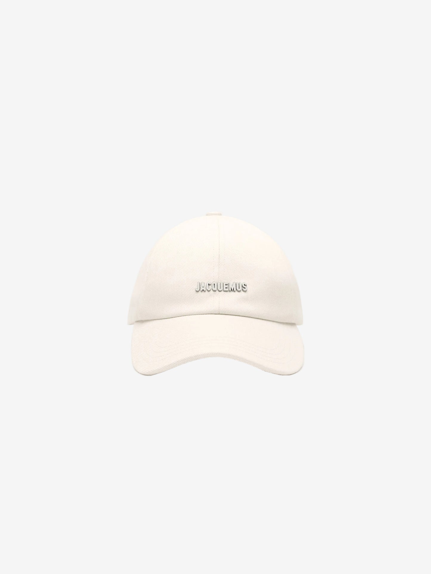 Beige cap with 'JACQUEMUS' branding on a white background