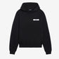 Black hoodie with a small logo on the chest against a white background