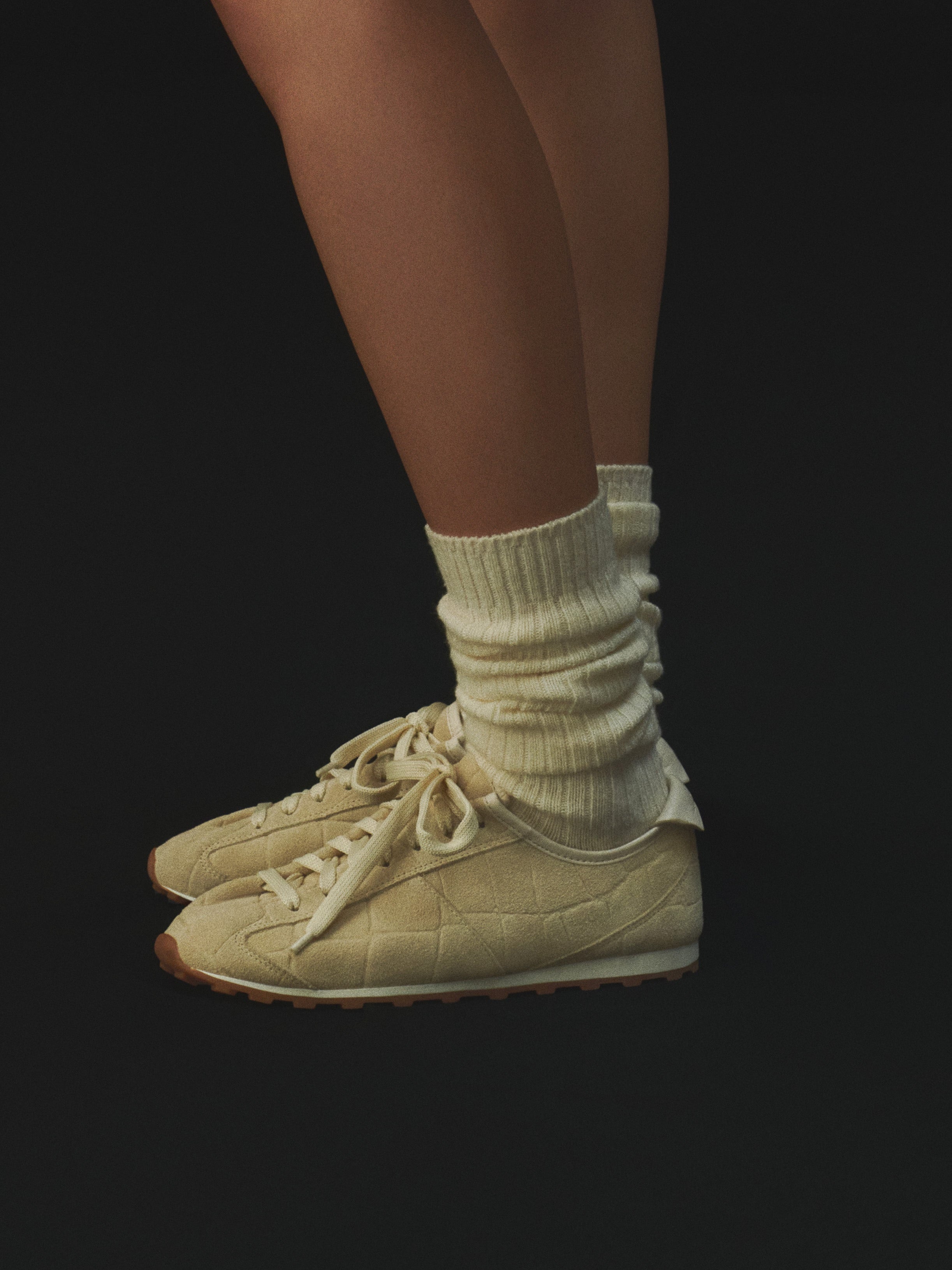Beige sneaker on a white background
